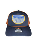 Western Anglers - Richardson Trucker Hat - Midnight Sippers Woven Patch -Navy/Orange